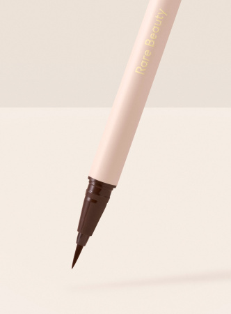 Купить RARE BEAUTY by Selena Gomez Perfect Strokes Matte Liquid Liner - Brown на Beautystorage.ru. Быстрая доставка по России и СНГ.